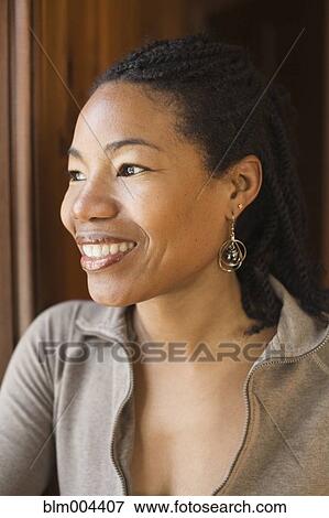 African woman smiling View Large Photo Image Stock Photo - African woman smiling. Fotosearch