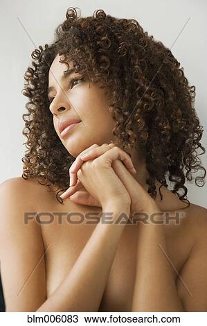 Stock Image - Alluring topless mixed race woman. Fotosearch