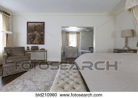 Armchair and bed in ornate bedroom View Large Photo Image Stock Image - Armchair and bed in ornate bedroom. Fotosearch