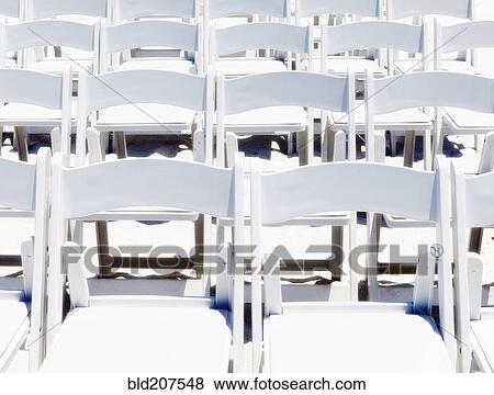 Stock Photo - Arrangement of Folding Chairs Outdoors. Fotosearch