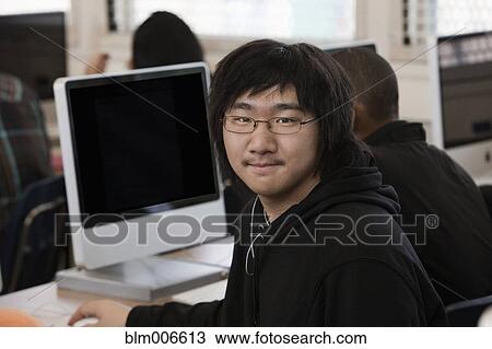 Asian student in computer lab View Large Photo Image Stock Image - Asian student in computer lab. Fotosearch