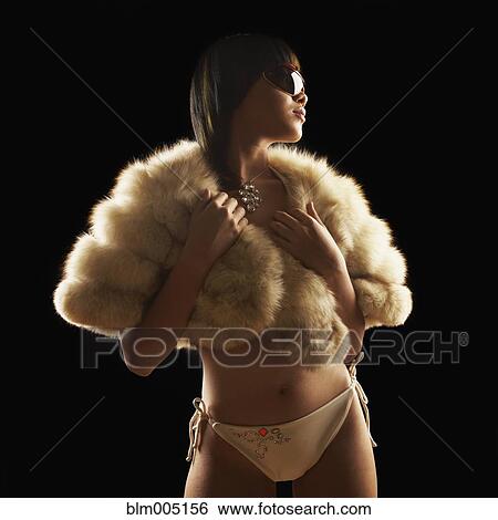 Asian woman in bikini and fur wrap View Large Photo Image Stock Photograph - Asian woman in bikini and fur wrap. Fotosearch