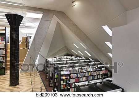 Stock Image - Balcony overlooking bookshelves in library at Narva College, Tartu University, Tartu, Tartu, Estonia. Fotosearch