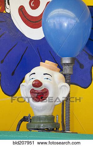 Stock Image - Balloon Clown Carnival Game. Fotosearch