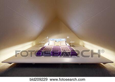 Stock Photo - Bed in modern bedroom. Fotosearch
