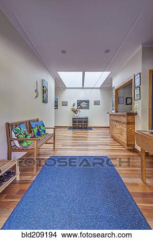 Picture - Benches and tables in hotel lobby. Fotosearch