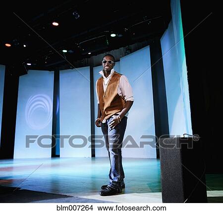 Black man modeling clothing View Large Photo Image Picture - Black man modeling clothing. Fotosearch