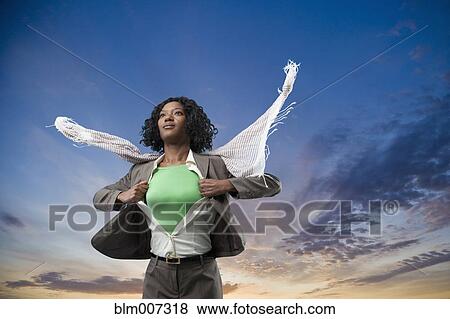 Black superhero changing clothes outdoors View Large Photo Image Stock Photo - Black superhero changing clothes outdoors. Fotosearch