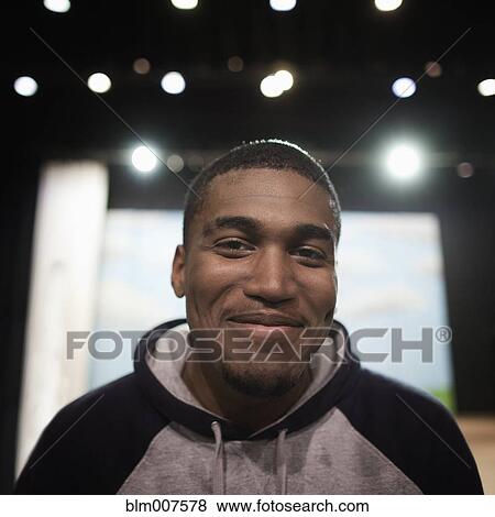 Black teenager on stage View Large Photo Image Stock Photo - Black teenager on stage. Fotosearch