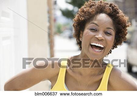 Black woman laughing View Large Photo Image Stock Photo - Black woman laughing. Fotosearch