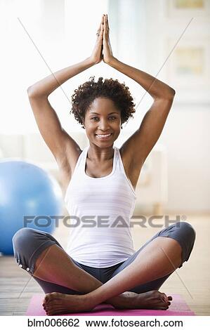 Black woman practicing yoga View Large Photo Image Stock Image - Black woman practicing yoga. Fotosearch