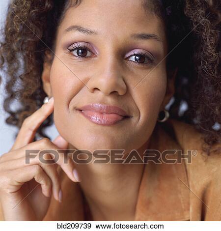 Stock Photo - Black woman smiling. Fotosearch