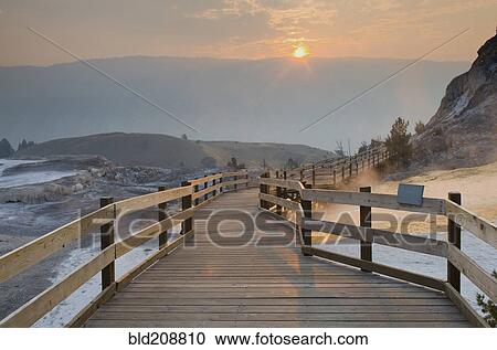 Boardwalk over the waters and landscape of the hot springs View Large Photo Image Stock Image - Boardwalk over the waters and landscape of the hot springs. Fotosearch