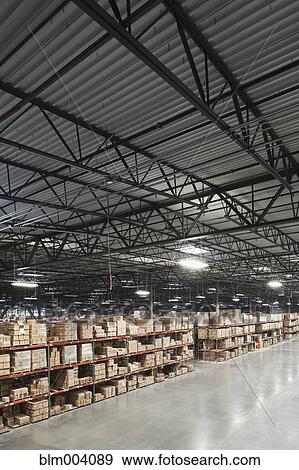Boxes on shelves in warehouse View Large Photo Image Stock Photo - Boxes on shelves in warehouse. Fotosearch