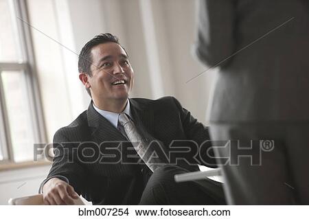 Business people in meeting View Large Photo Image Picture - Business people in meeting. Fotosearch