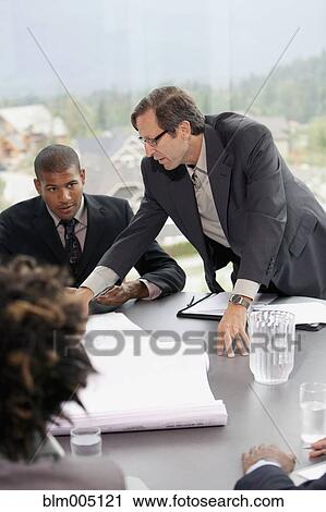 Business people in meeting View Large Photo Image Stock Image - Business people in meeting. Fotosearch