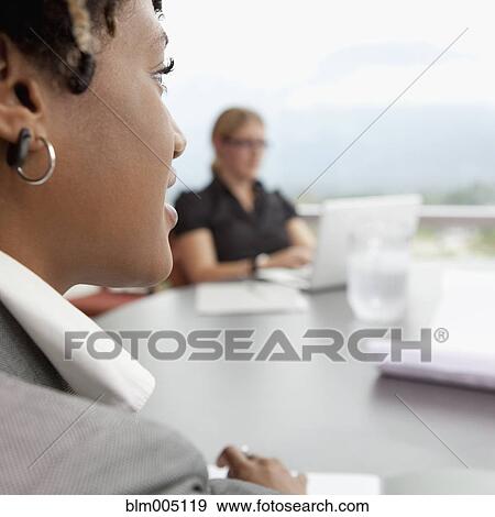 Business people in meeting View Large Photo Image Stock Photo - Business people in meeting. Fotosearch