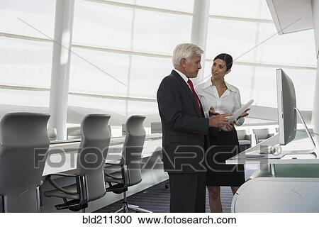 Business people talking in conference room View Large Photo Image Stock Image - Business people talking in conference room. Fotosearch