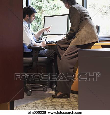 Stock Photography - Business people working together. Fotosearch