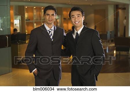 Businessmen smiling View Large Photo Image Picture - Businessmen smiling. Fotosearch