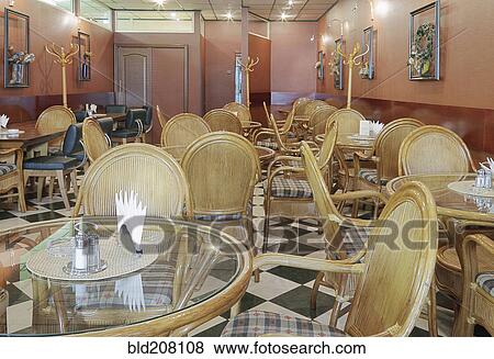 Stock Photo - Cafe With Rattan Chairs and Tables. Fotosearch