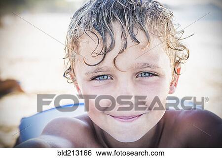 Stock Photograph - Caucasian boy smiling. Fotosearch