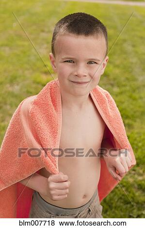 Caucasian boy wrapped in towel View Large Photo Image Stock Photo - Caucasian boy wrapped in towel. Fotosearch