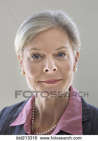 Caucasian businesswoman smiling View Large Photo Image Stock Photograph - Caucasian businesswoman smiling. Fotosearch
