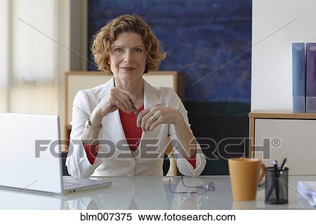 Caucasian businesswoman with laptop View Large Photo Image Stock Photography - Caucasian businesswoman with laptop. Fotosearch