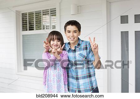 Caucasian children making peace signs View Large Photo Image Picture - Caucasian children making peace signs. Fotosearch