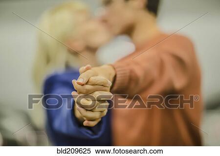 Caucasian couple holding hands View Large Photo Image Stock Photography - Caucasian couple holding hands. Fotosearch