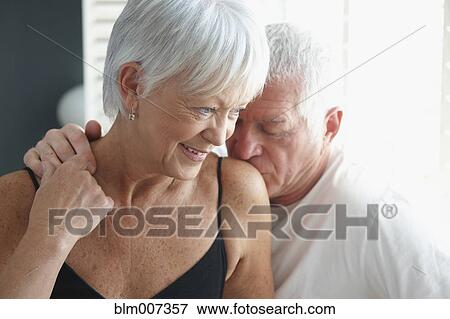 Caucasian couple kissing View Large Photo Image Stock Photo - Caucasian couple kissing. Fotosearch