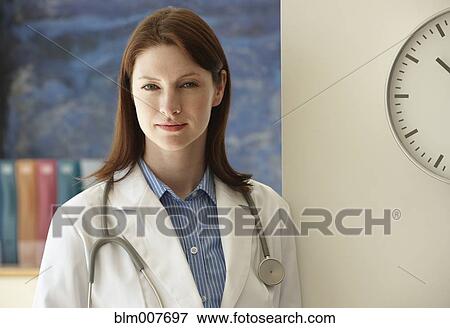 Stock Photo - Caucasian doctor in doctor's office. Fotosearch