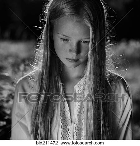 Caucasian girl looking down View Large Photo Image Stock Image - Caucasian girl looking down. Fotosearch