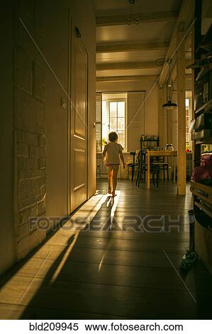Caucasian girl walking in kitchen View Large Photo Image Stock Photography - Caucasian girl walking in kitchen. Fotosearch