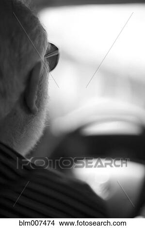 Caucasian man driving View Large Photo Image Picture - Caucasian man driving. Fotosearch