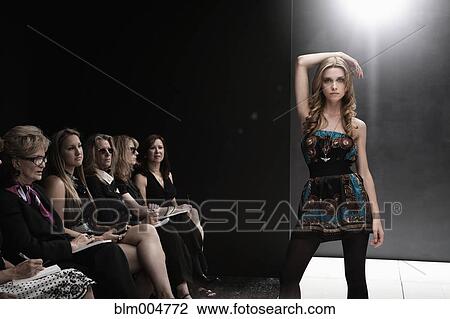 Caucasian model on runway in fashion show View Large Photo Image Stock Image - Caucasian model on runway in fashion show. Fotosearch
