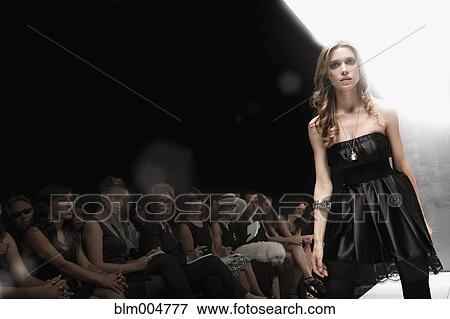 Caucasian model on runway in fashion show View Large Photo Image Stock Photo - Caucasian model on runway in fashion show. Fotosearch