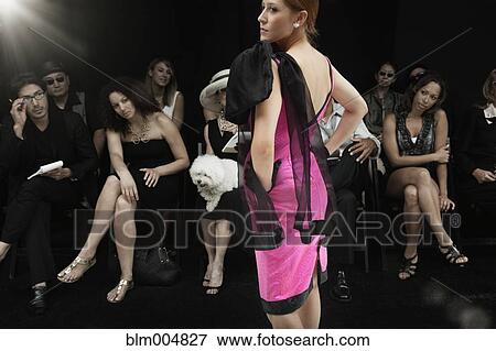 Stock Photo - Caucasian model on runway in fashion show. Fotosearch