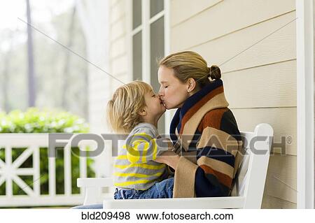 Stock Photo - Caucasian mother and son kissing. Fotosearch