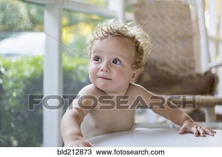 Caucasian toddler standing on porch View Large Photo Image Stock Image - Caucasian toddler standing on porch. Fotosearch