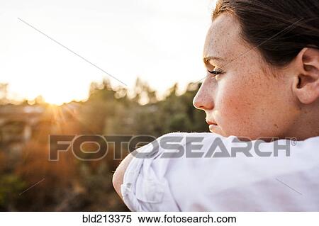 Stock Photography - Caucasian woman overlooking landscape. Fotosearch