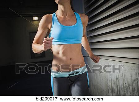 Caucasian woman running View Large Photo Image Stock Photo - Caucasian woman running. Fotosearch