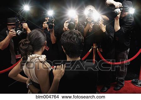 Picture - Celebrities posing on red carpet. Fotosearch