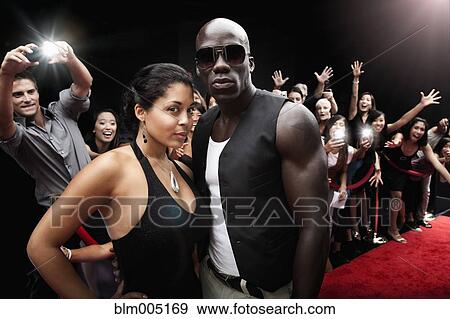 Celebrities posing on red carpet View Large Photo Image Stock Photo - Celebrities posing on red carpet. Fotosearch