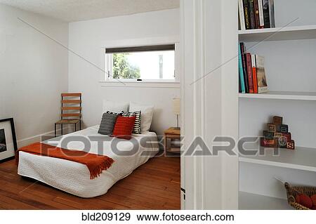 Chair and bed in bedroom View Large Photo Image Stock Photo - Chair and bed in bedroom. Fotosearch
