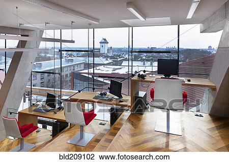 Stock Image - Chairs and desks in library at Narva College, Tartu University, Tartu, Tartu, Estonia. Fotosearch