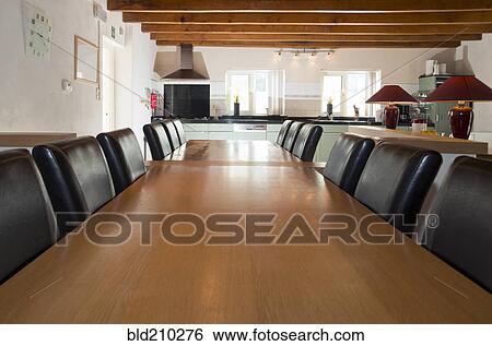 Chairs at empty dining tables View Large Photo Image Stock Photograph - Chairs at empty dining tables. Fotosearch