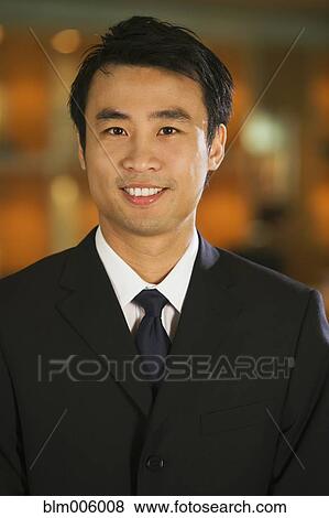 Chinese businessman smiling View Large Photo Image Stock Photo - Chinese businessman smiling. Fotosearch