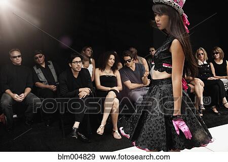 Stock Photo - Chinese model on runway in fashion show. Fotosearch